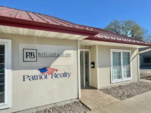 Exterior of insurance office with sign