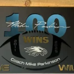 Plaque celebrating 100 wins